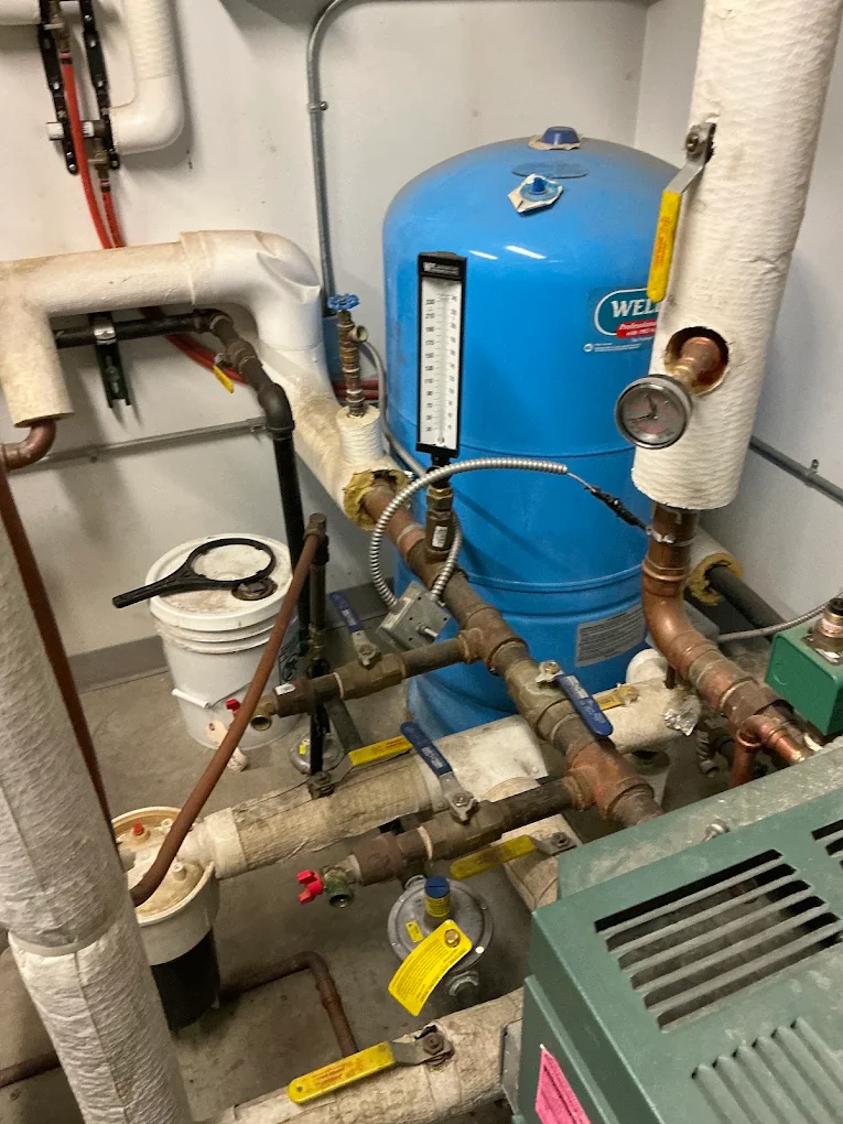 pipes and plumbing connected to hvac machine